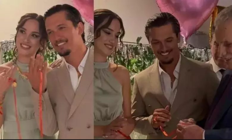 Oyuncu Boğaç Aksoy nişanlısıyla nişan yüzüklerini takarken mutlu bir anını paylaşıyor